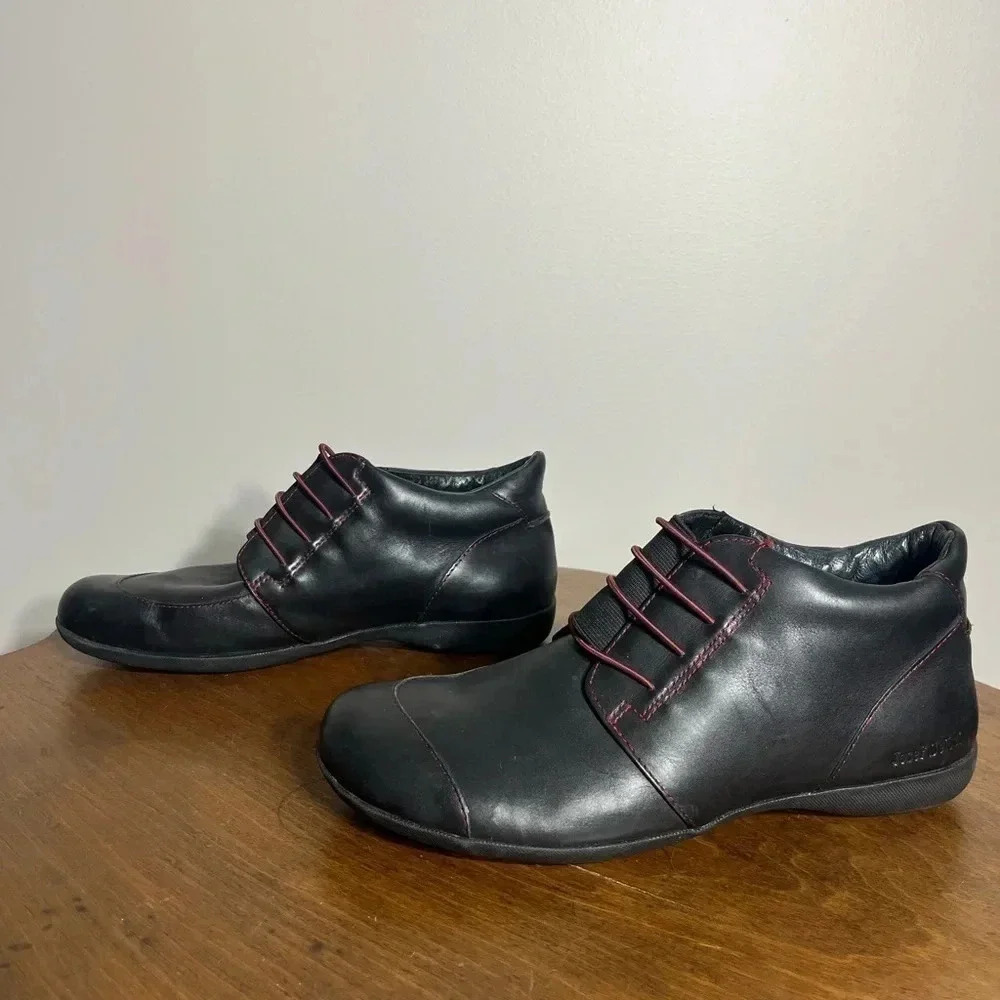 Women’s Josef Seibel black leather slip on booties, size 42